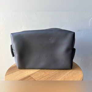 Rains Black Travel Bag